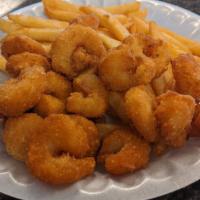 Popcorn Shrimp -Full · Bite-sized (but still big!) portions of our wild caught Gulf shrimp, brined and breaded. Ful...