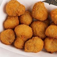 Mushrooms · Breaded mushrooms. About 8 per order.