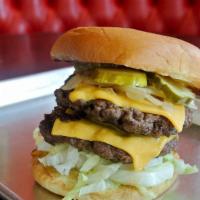 Big Kahuna · Two 8 ounce spagburger patties, grilled onions, lettuce, double cheese, pickle and spag zip ...