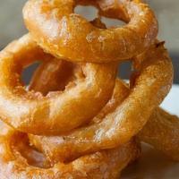 Beer Battered Onion Rings · No explaination needed, served with your favorite sauce.