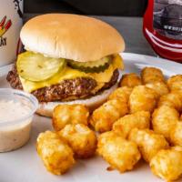Juicy Lucy · Premium black Angus beef smothered in cheese, topped with pickles, and your choice of dressi...