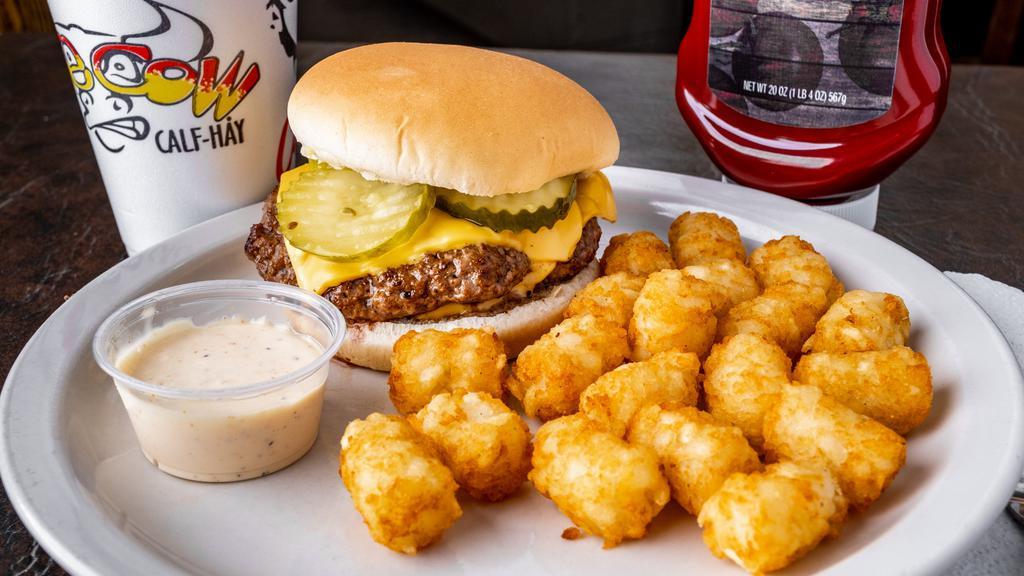Juicy Lucy · Premium black Angus beef smothered in cheese, topped with pickles, and your choice of dressing.