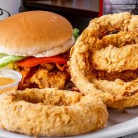 Chicken Club Sandwich · Hand-breaded or grilled chicken breast, lettuce, tomatoes, smoked bacon, American cheese and...