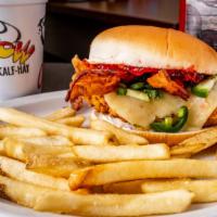 Ultimate Chicken Sandwich · Hand-breaded chicken breast, melted Pepper Jack cheese, sweet and spicy jalapeño jelly, crea...