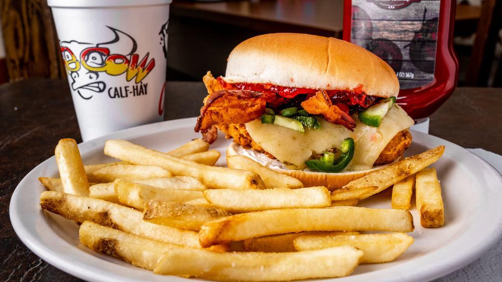 Ultimate Chicken Sandwich · Hand-breaded chicken breast, melted Pepper Jack cheese, sweet and spicy jalapeño jelly, cream cheese, grilled jalapeños and smoked bacon.