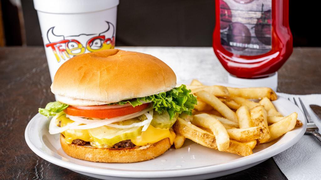 Classic Cow Cheeseburger · Premium black Angus beef covered in melted American cheese, crisp lettuce, fresh tomatoes, onions and pickles with your choice of dressing.