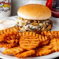 Barnyard Burger · Premium black Angus beef topped with sautéed mushrooms, Pepper Jack cheese, grilled onions a...