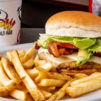 California Turkey Burger · All white meat turkey patty topped with Swiss cheese, smoked bacon, avocado, crisp lettuce, ...