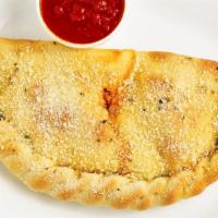 Cheese Calzones · Folded pizza dough stuffed with mozzarella, sauce and your choice of ingredients.