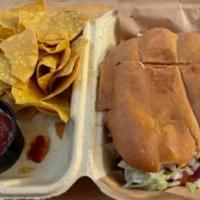 Don Ramon Torta · A grilled French roll, with your choice of meat, melted cheese, beans, tomato, lettuce, onio...