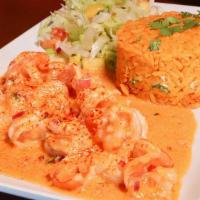 Camarón A La Diabla · A dozen grilled shrimp, onions and bell peppers cooked in spicy salsa. Served with rice, bea...