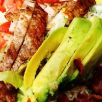 Cobb Salad · Fresh salad greens topped with Monterey jack cheese, grilled chicken breast, tomato, black o...