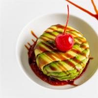 Dinosaur Egg · Spicy lobster salad covered by sliced avocado and served with spicy chefs sauce.