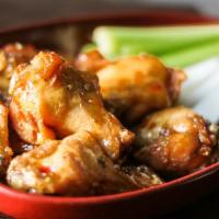 Replay Chicken Wings · Choice of wing sauce. Served with fresh celery, jicama sticks and choice of dressing.