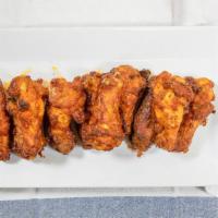 Hot & Spicy Buffalo Chicken Wings · 1 lb. of oven-roasted chicken wings tossed in fiery buffalo