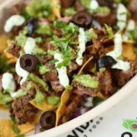 Walking Taco · In house fried tortilla strips  topped with your choice of protein and your choice of three ...