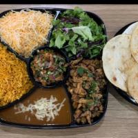 Family 4 Taco Bar · Family Taco Bar for up to 4 people.
 
Rice & Beans with your choice of protein, flour or cor...