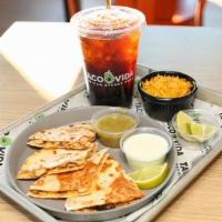 Mini Quesadilla · Choice of protein and 2 toppings.  Includes a drink and one side: chips, rice or beans.