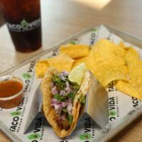 One Taco (Kids) · Choice of protein and 2 toppings.  Includes a drink and one side: chips, rice or beans.