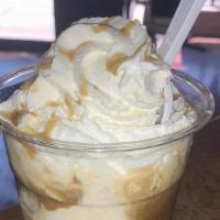 Affogato · Organic vanilla bean ice cream with a double shot of organic espresso and topped with whippe...