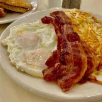Old Fashioned Breakfast (Dd) · Two eggs any style, three slices of bacon or sausage links or two sausage patties, garden po...
