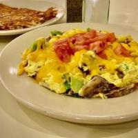 Works Scramble (Dd) · Scrambled eggs, bacon, sausage, ham, cheese, tomatoes, onions, green peppers, broccoli, and ...