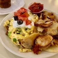 Santa Fe Omelet (Dd) · Diced sausage, tomatoes, onions, green peppers, and black olives topped with Monterey jack c...
