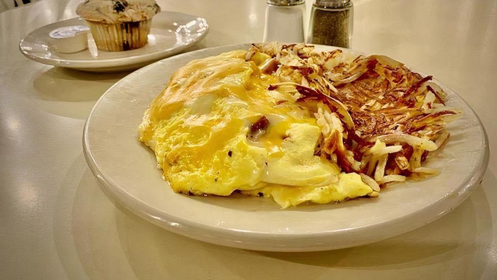 Ham & Cheese Omelet (Dd) · A classic! Three egg omelet made with fresh eggs plenty of diced ham and melted American cheese.