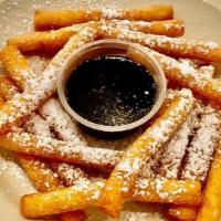Funnel Fries (Dd) · Funnel cake like never before formed into fries then dropped in the fryer sprinkled with pow...