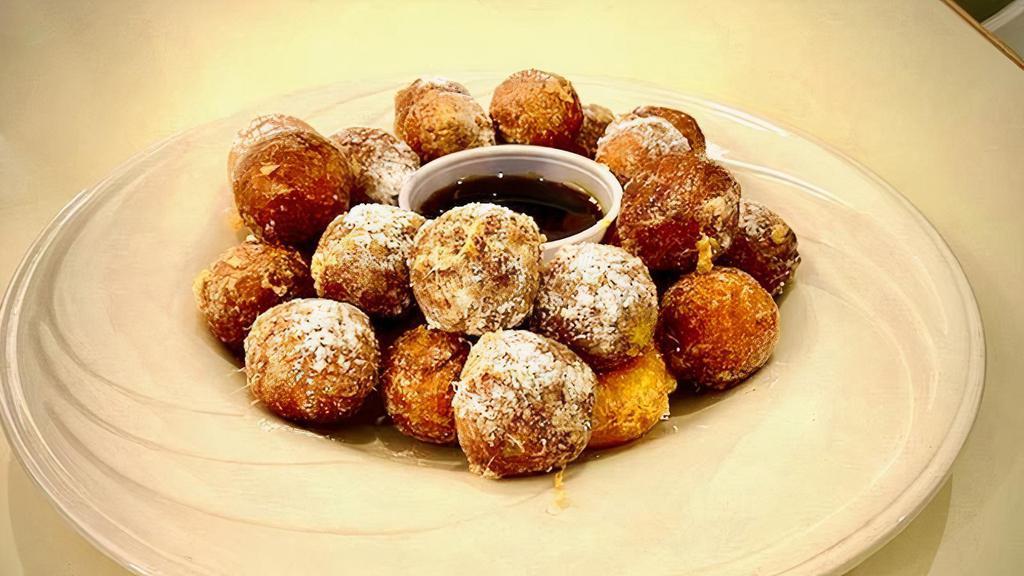 Donut Holes (Dd) · French toast has never been better 12 bit sized donut holes dipped in scrambled eggs the dropped in the fryer sprinkles with powder sugar and served with syrup