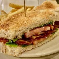 Blt · five strips of thick cut bacon, lettuce, tomato & mayo on toasted sourdough make it a melt f...