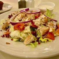Chicken Blt Salad · mixed greens topped with grilled chicken tenders, bacon, tomatoes, croutons, Monterey jack c...