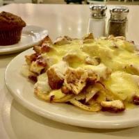 New Hampton Casserole · grilled chicken tenders, onions, monterey jack cheese and creamy hollandaise