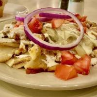 Rockbrook Casserole · grilled chicken tenders, mushrooms, white and red onions, tomatoes, Monterey jack cheese and...