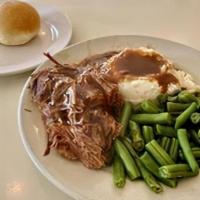 Meltaway Pot Roast · a generous portion of our slow roasted pot roast served with mashed potatoes and gravy, incl...