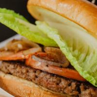 Impossible  Burger · Impossible patty, lettuce, grilled tomato, grilled onion, pickle, brioche bun.