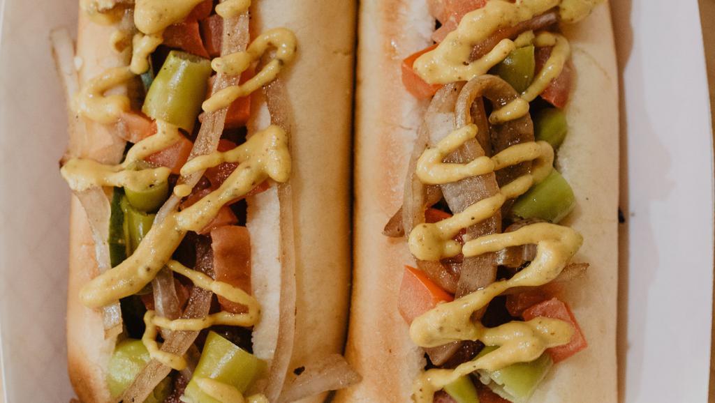 Chicago Dog · Dill pickle, sport pepper, relish, tomato, grilled onions, seikle’s mustard.