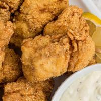 Catfish Nuggets · Includes fries and coleslaw.