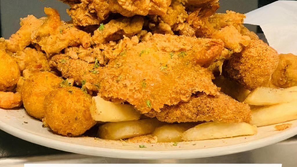Seafood Platter · All your favorites in one! Fried shrimp, fried catfish, frog legs, alligator tail, crawfish, chicken and oysters.