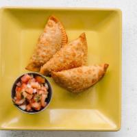 Irazu Empanada Trio By Irazu · By Irazu. Assortment of chicken, beef, potato, spinach and cheese. Contains gluten, dairy, s...