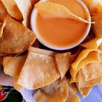 Chimi'S Original Queso · A Chimi's specialty. You must try this delicious blend of perfectly melted smoked cheeses wi...