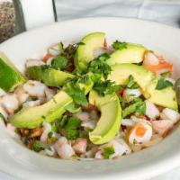 Shrimp Ceviche · Fresh shrimp marinated in lime juice and mixed with pico de gallo. Topped with avocado. The ...