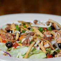 Southwest Chicken Salad · Enjoy diced grilled chicken on a bed of fresh lettuce, along with tomatoes, cheese, olives, ...