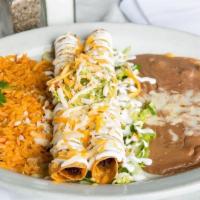 3 Flautas  · Shredded beef or shredded chicken rolled in con tortillas, fried and topped with our fresh g...