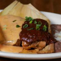 2 Tamales · Traditional tamales filled with your choice of shredded beef (topped with house-made chili) ...