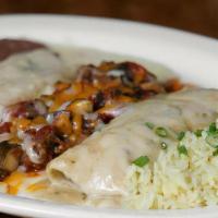 Vegetarian Platter · A cheese enchilada topped with our signature white queso and Monterey Jack cheese, Florentin...