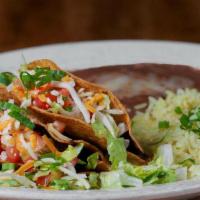 3 Traditional Tacos · Shredded beef or shredded chicken wrapped in a corn tortilla and then deep fried. Includes l...