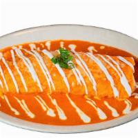 Wet Burrito · Your choice of ground beef, shredded beef or shredded chicken stuff with rice, refried beans...