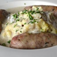 Sausage & Champs · An old country specialty. Our exclusively made Irish sausages and champ potatoes topped with...