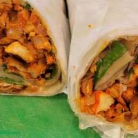 Chicken Burrito · Seasoned Chicken Grilled with Onions , Potatoes, Green Peppers and Mixed Vegetables then Gri...